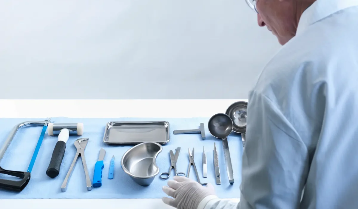 medical-professional-examines-instruments-on-a-ste-2026-03-25-02-24-54-utc